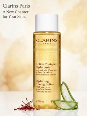 Clarins Hydrating Toning Lotion — Gold and White